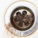 How to Fix a Slow-Draining Bathtub: Clear Stubborn Clogs Without Calling a Plumber