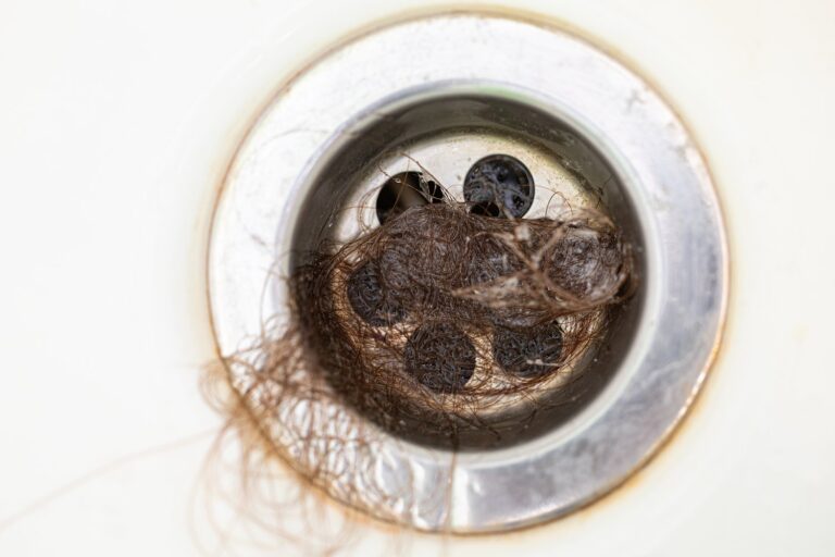 How to Fix a Slow-Draining Bathtub: Clear Stubborn Clogs Without Calling a Plumber